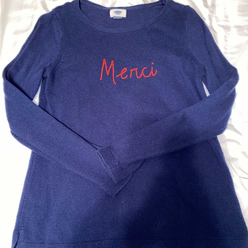 Navy blue and red “merci” sweater